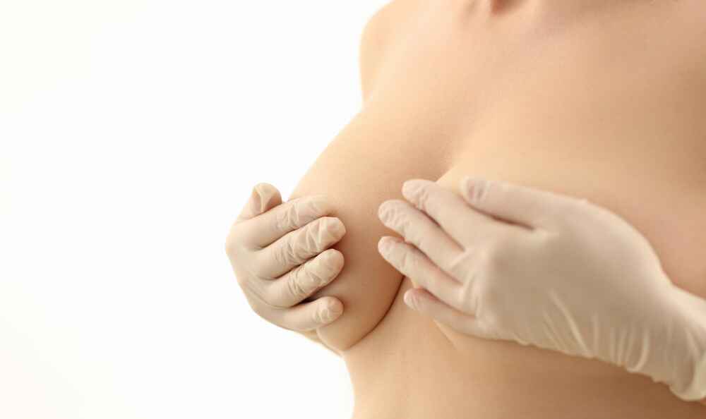 Combined Breast Lift and Augmentation Surgery in Kerala