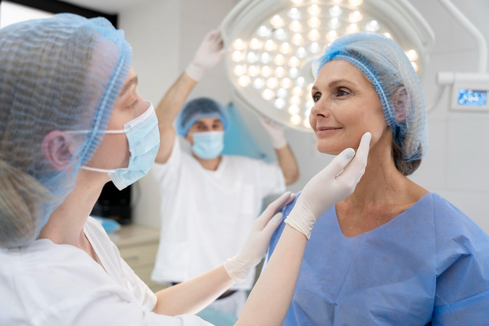 Dr. Prince performing a cosmetic procedure at Elite Hospital in Thrissur